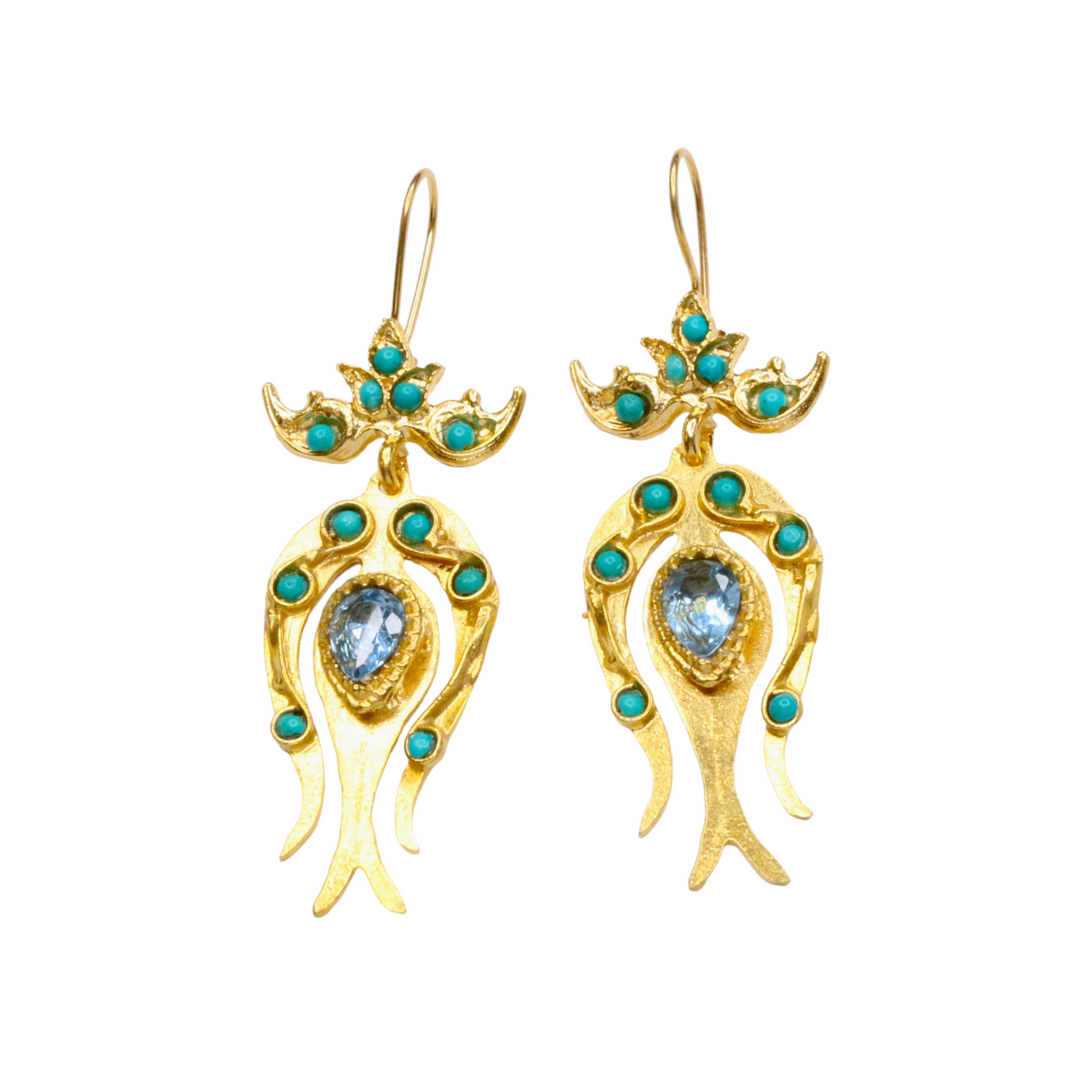 Gold earrings with turquoise stones on a white background