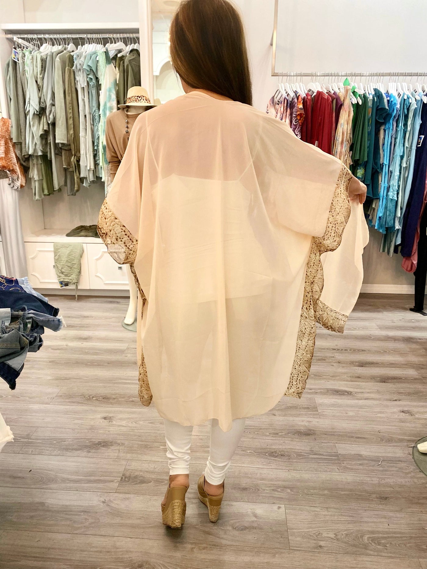 Back view of cream colored kimono with snakeskin accents